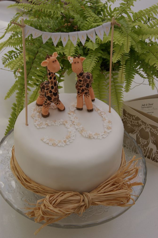 golden wedding giraffe cake