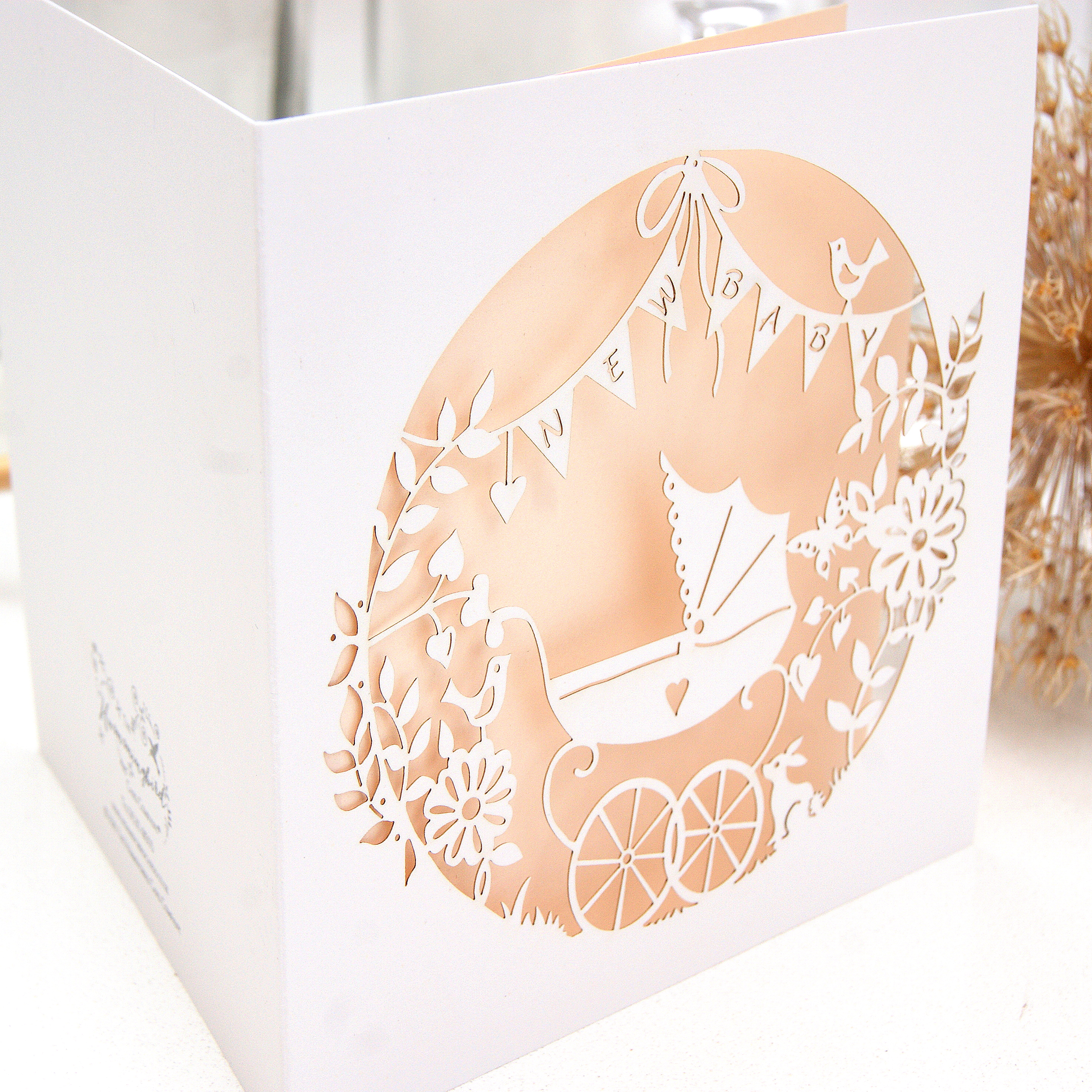Laser cut new baby card in pale pink